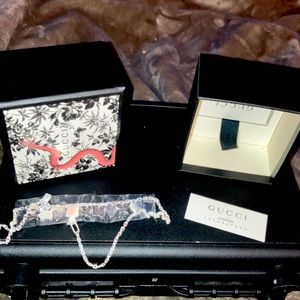 Gucci charm necklace.. new in box..never worn.. authenticity included in box..